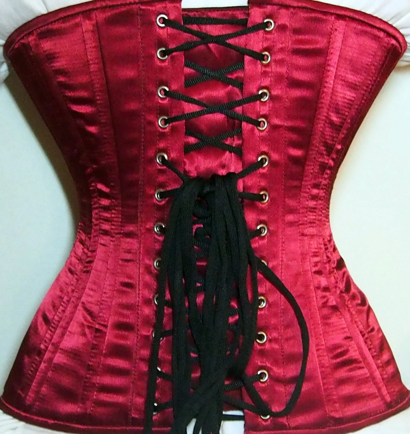 Exclusive red and black corset covered by laces. Lace Addicted Corsettery collection. Gothic, custom made, steampunk, waist training corset