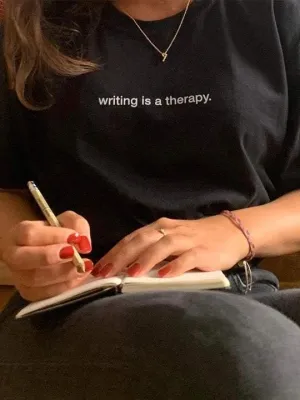 writing is a therapy. T-Shirt